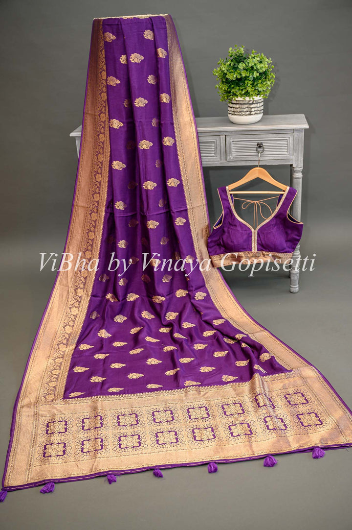 Purple Banarasi Silk Saree And Blouse With Gold Zari Motifs And Borders.