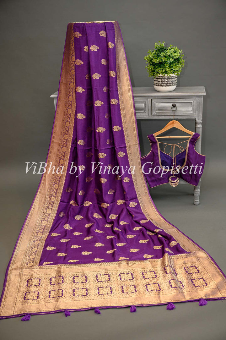 Purple Banarasi Silk Saree And Blouse With Gold Zari Motifs And Borders.