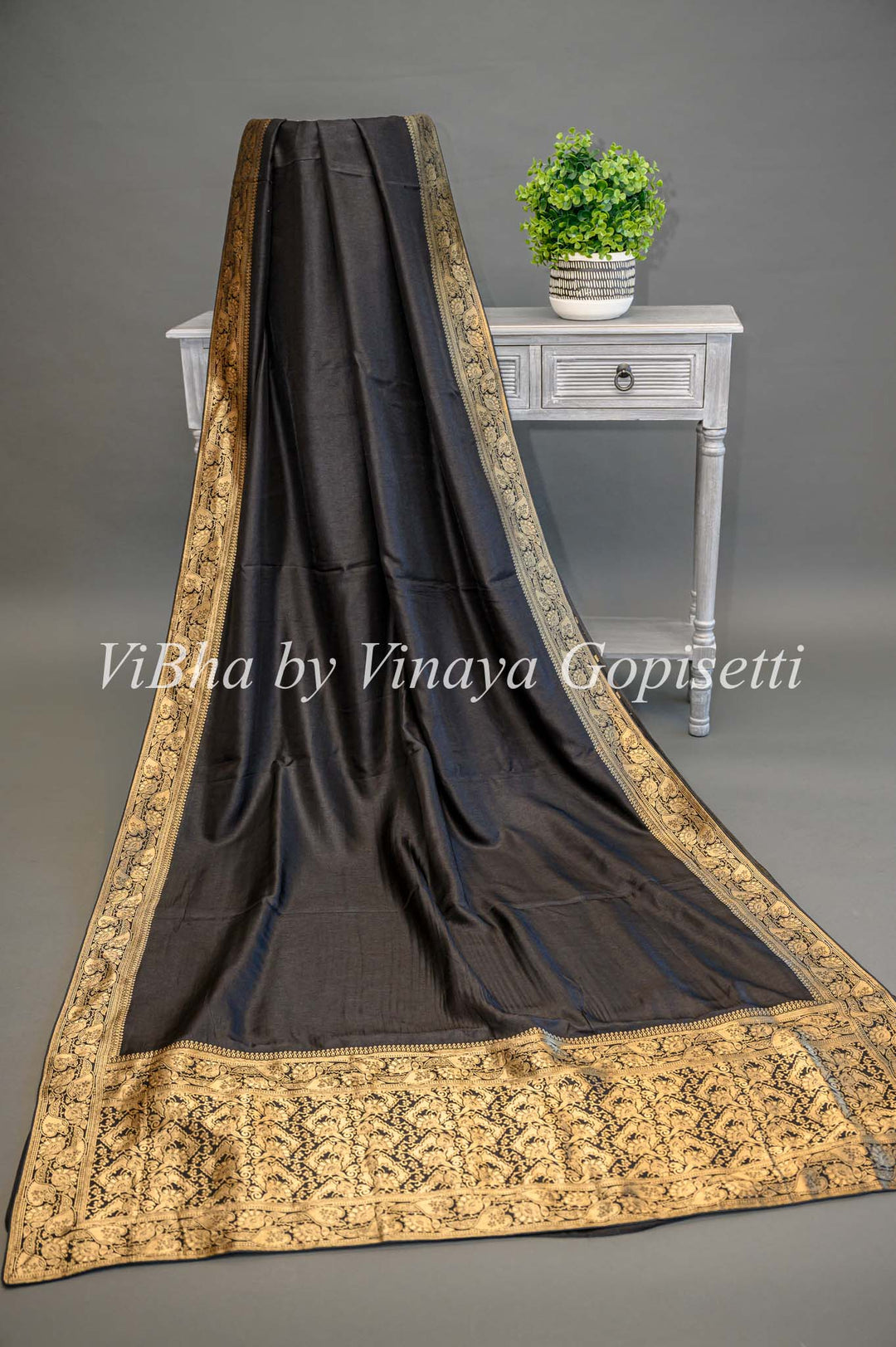 Black Banarasi Silk Saree And Blouse With Gold Zari Borders