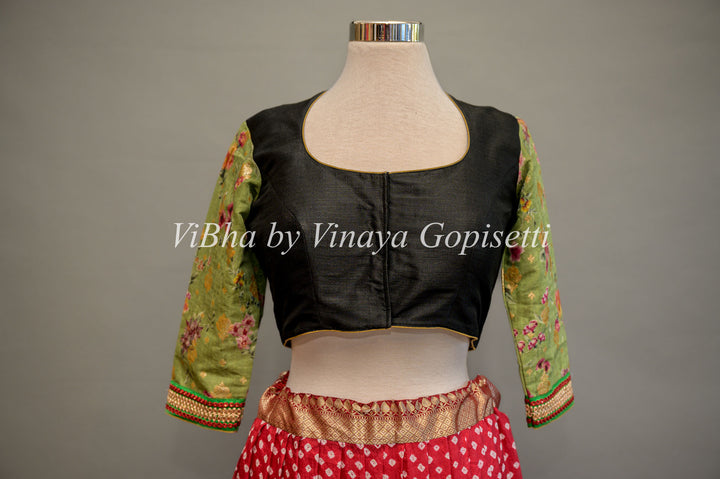 Black hand painted blouse with embroidery and floral sleeves.