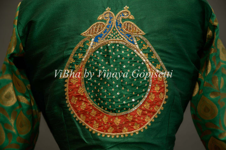 Green hand painted blouse with embroidery and benares brocade sleeves