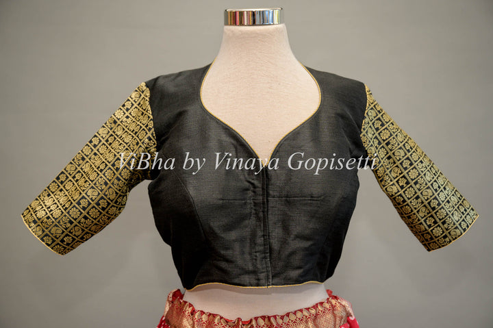 Black hand painted blouse with embroidery and Benares brocade sleeves.