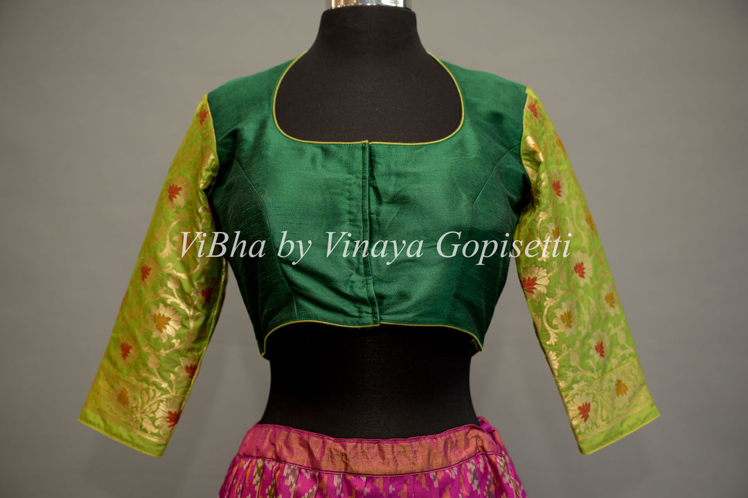 Green hand painted blouse with embroidery and benares brocade sleeves