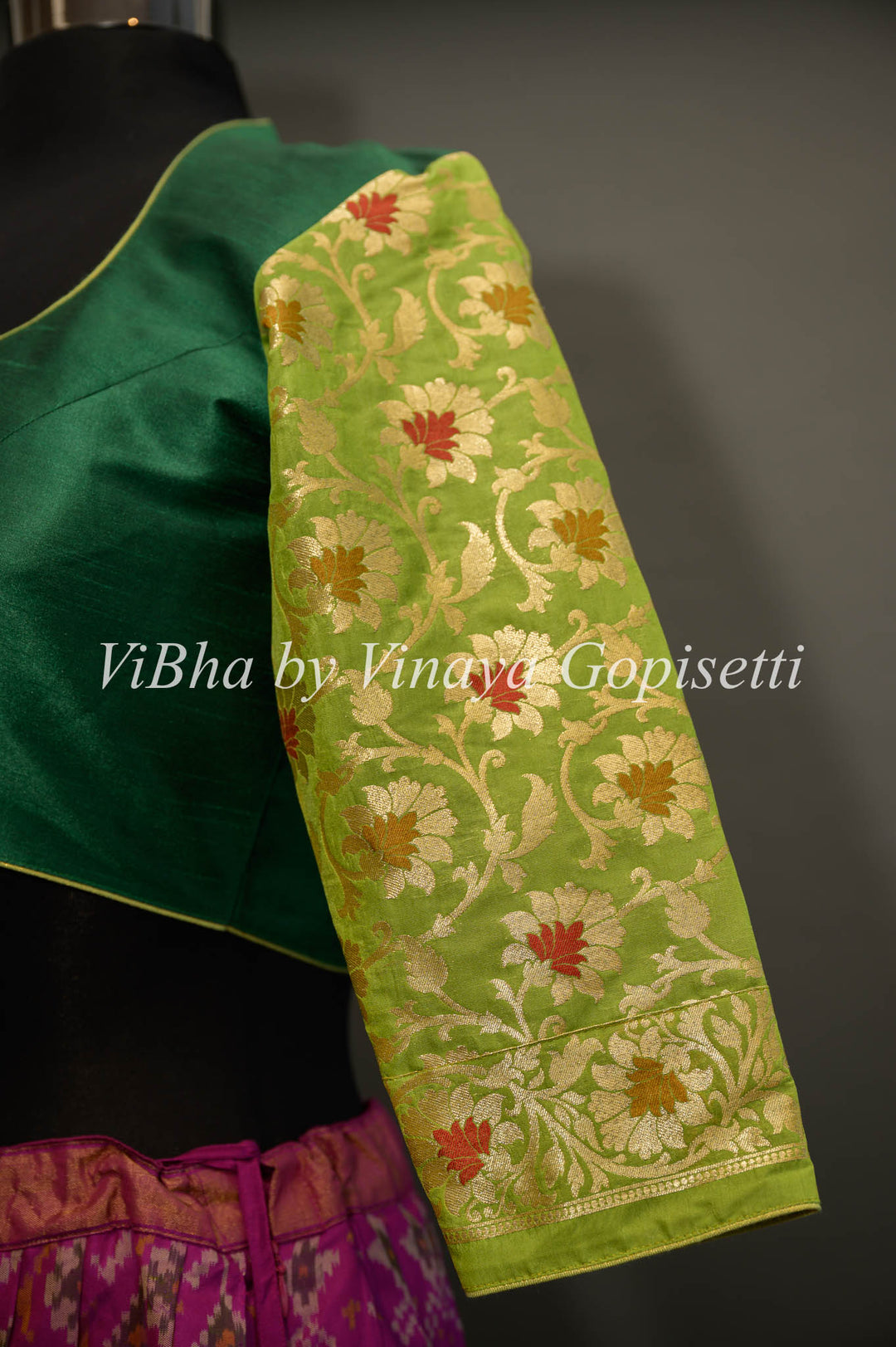 Green hand painted blouse with embroidery and benares brocade sleeves