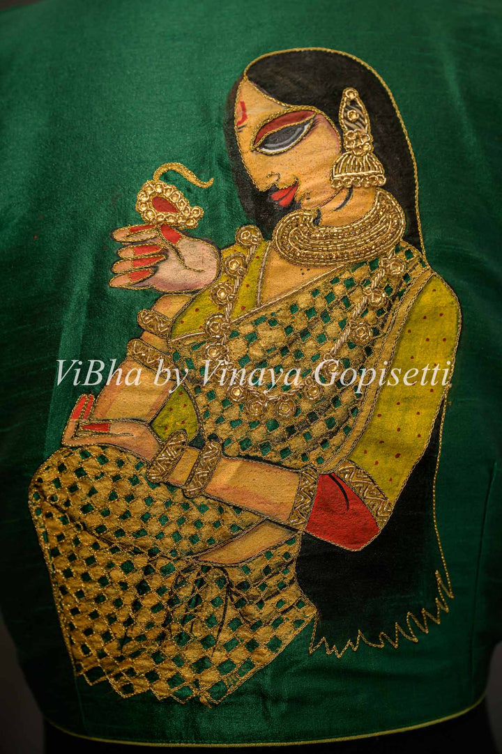 Green hand painted blouse with embroidery and benares brocade sleeves