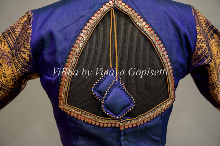 Royal Blue Gadwal Silk Blouse with embroidered sleeves and back.