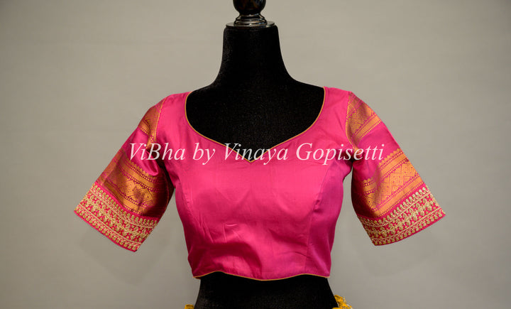 Rani Pink Gadwal Silk Blouse with embroidered sleeves.