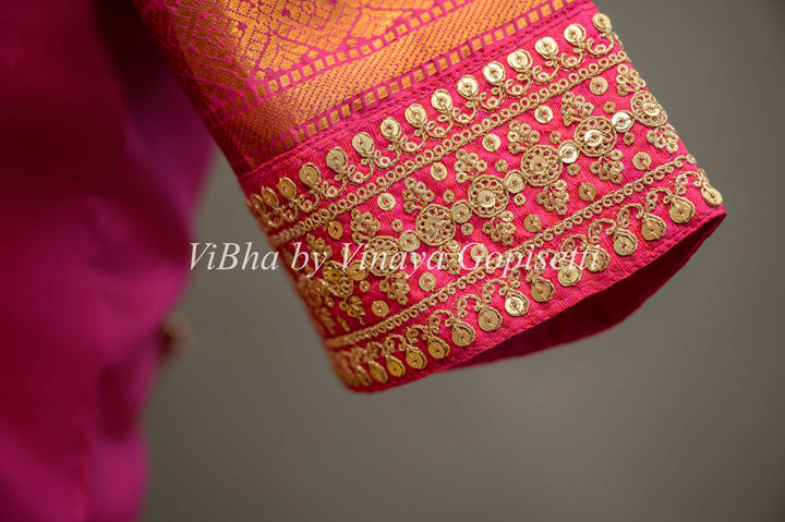 Rani Pink Gadwal Silk Blouse with embroidered sleeves.