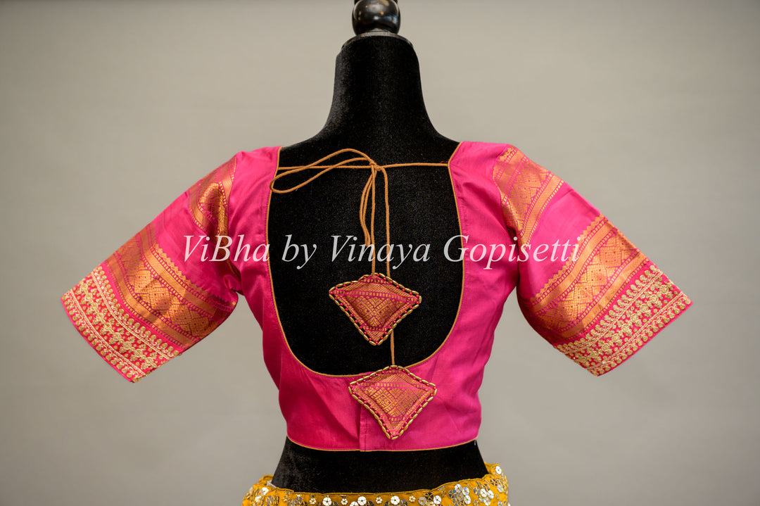 Rani Pink Gadwal Silk Blouse with embroidered sleeves.