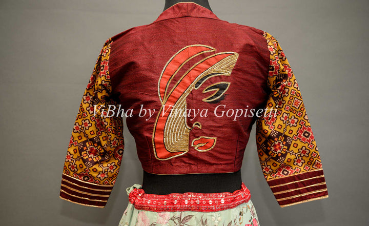 Maroon hand painted blouse with embroidery and patola sleeves