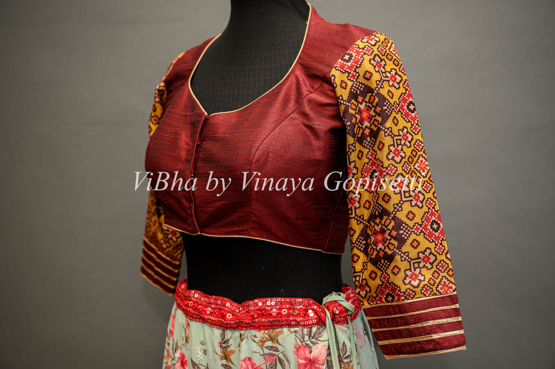 Maroon hand painted blouse with embroidery and patola sleeves