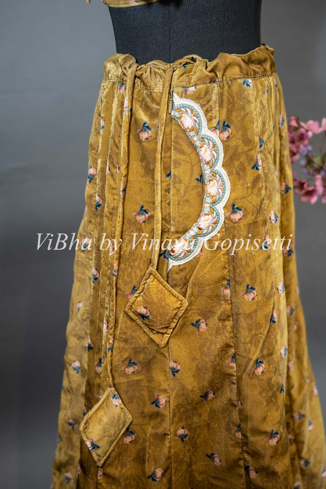 Yellowish Mehendi Green Embroidered Velvet Lehenga Set