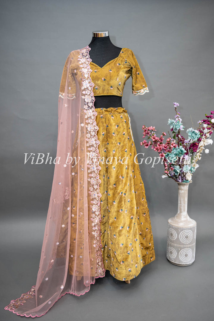 Yellowish Mehendi Green Embroidered Velvet Lehenga Set