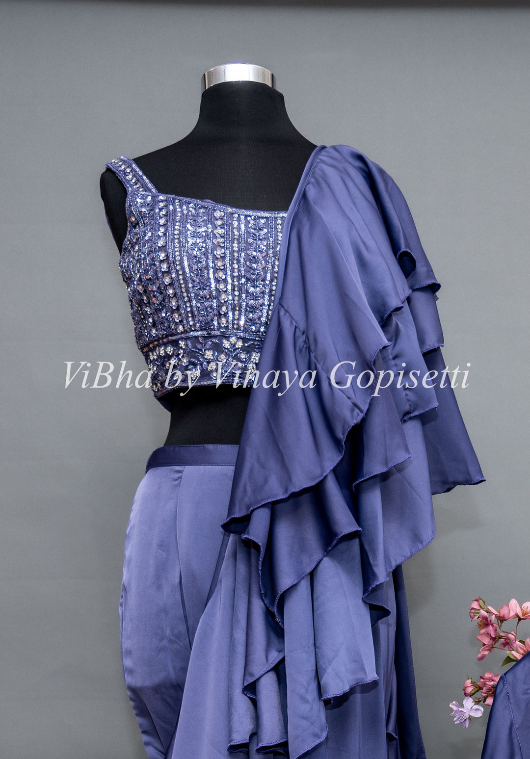 Ultra Violet Draped Saree with Ruffles And Embroidered Blouse