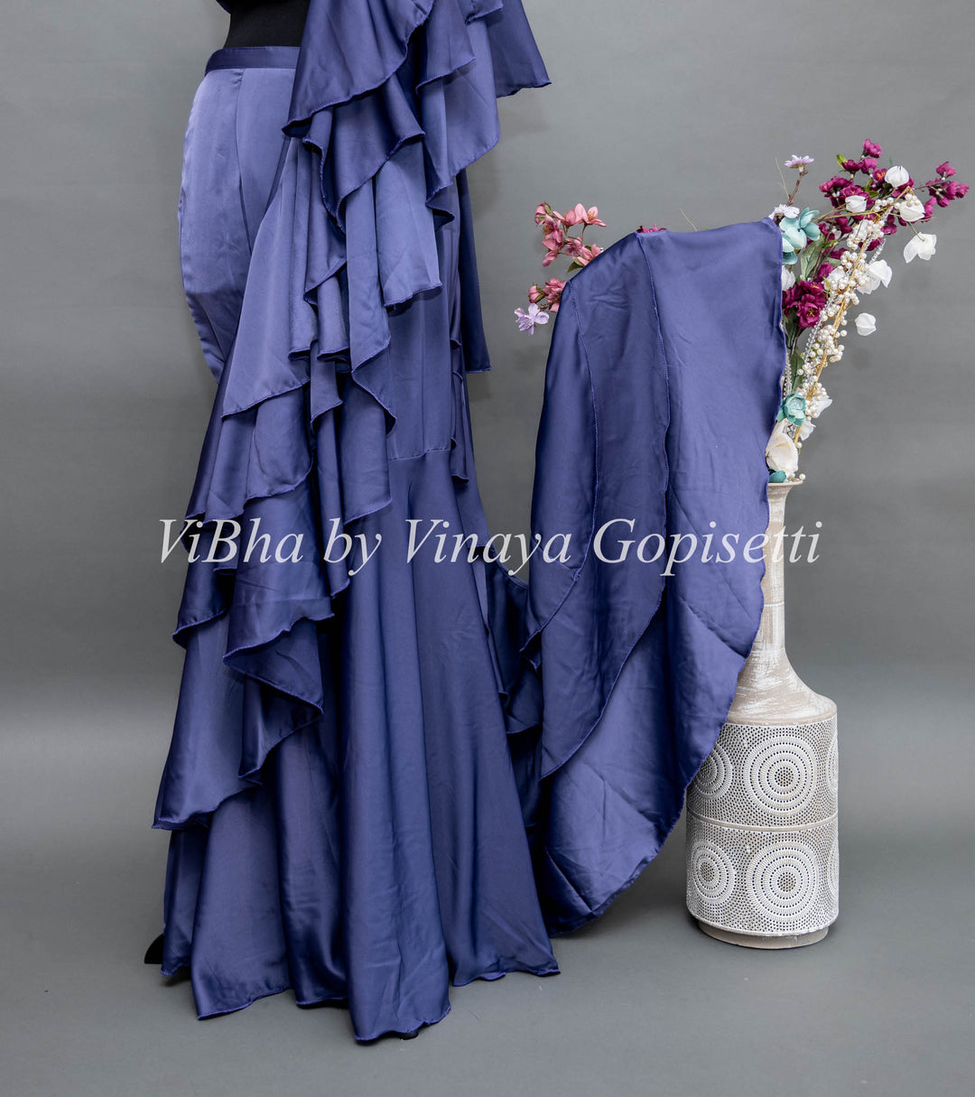 Ultra Violet Draped Saree with Ruffles And Embroidered Blouse