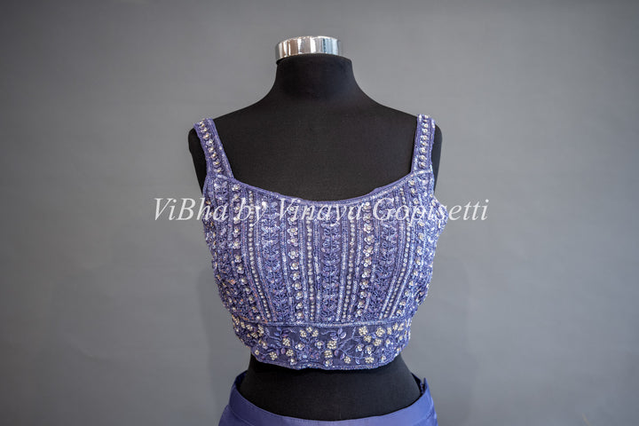 Ultra Violet Draped Saree with Ruffles And Embroidered Blouse