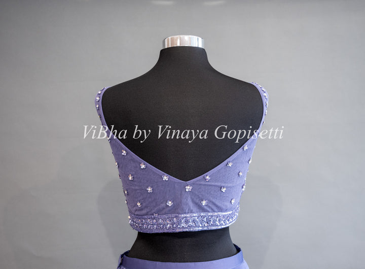 Ultra Violet Draped Saree with Ruffles And Embroidered Blouse