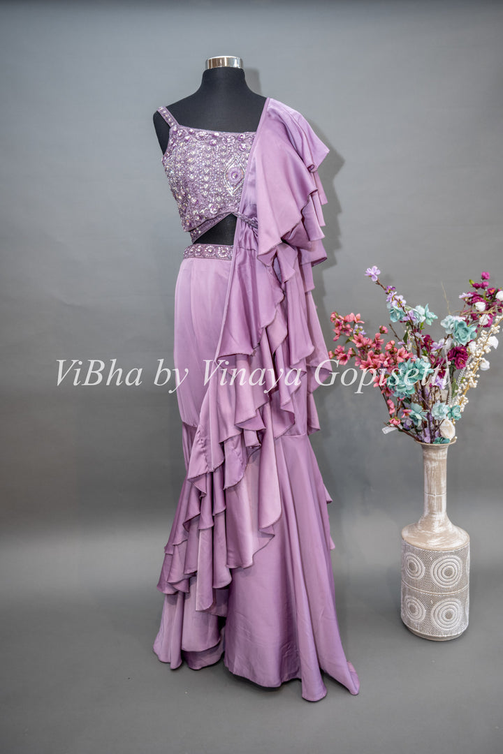 Mauve Draped Saree with Ruffles and Embroidered Blouse