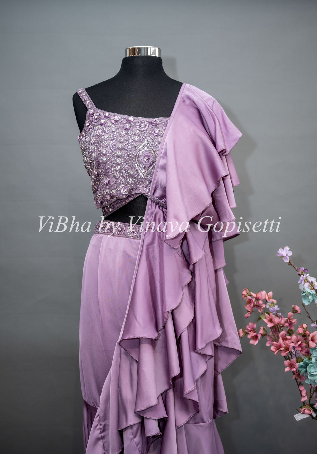 Mauve Draped Saree with Ruffles and Embroidered Blouse