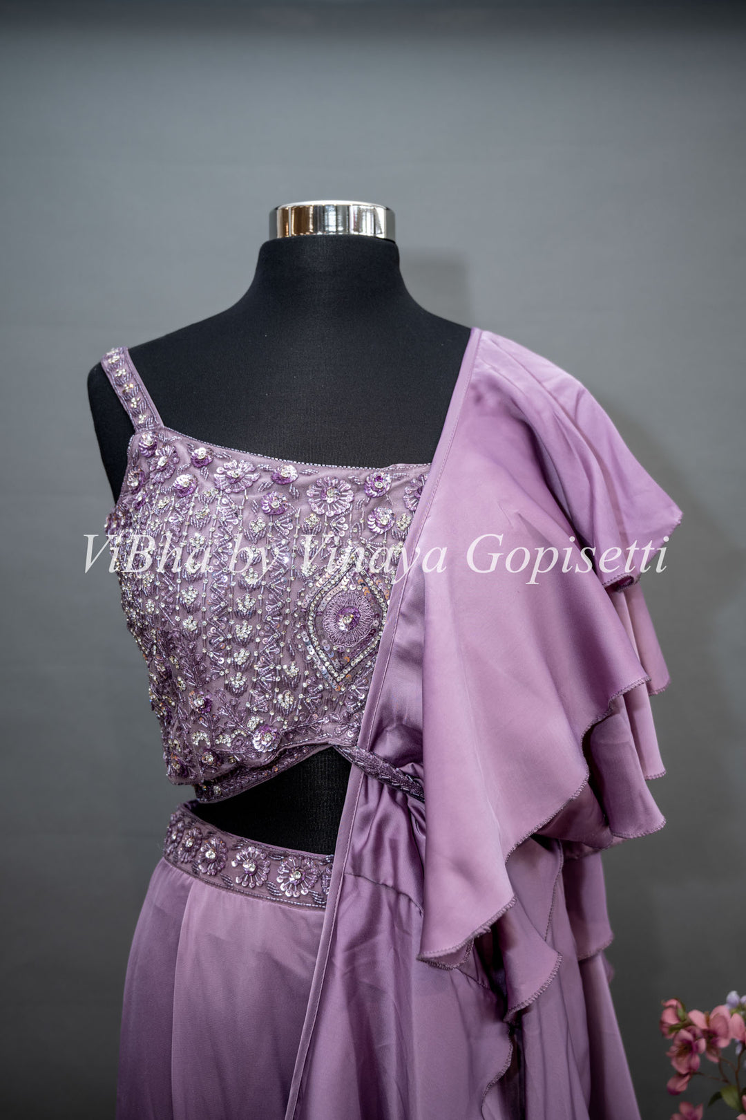 Mauve Draped Saree with Ruffles and Embroidered Blouse