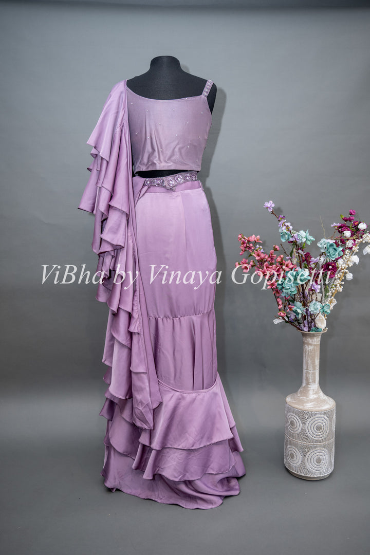 Mauve Draped Saree with Ruffles and Embroidered Blouse