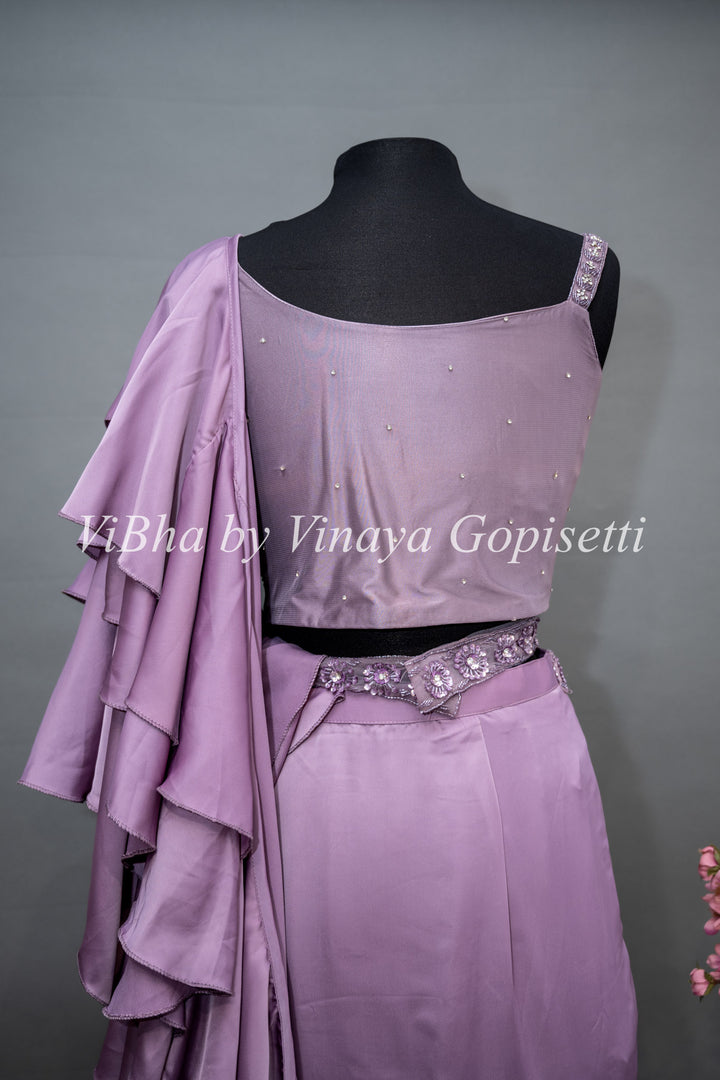 Mauve Draped Saree with Ruffles and Embroidered Blouse