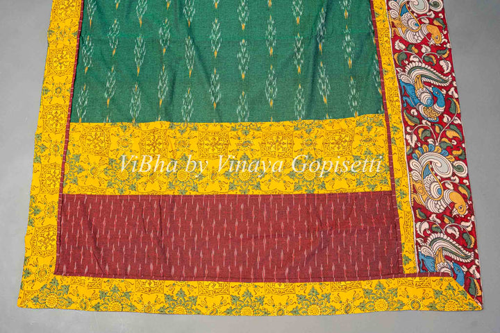 Green Ikkat Handloom Cotton With Yellow and Maroon Red Pen Kalamkari Borders Fusion Saree And Blouse