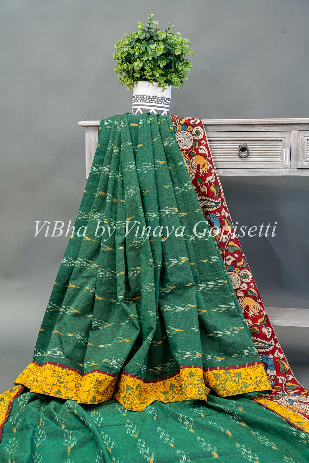 Green Ikkat Handloom Cotton With Yellow and Maroon Red Pen Kalamkari Borders Fusion Saree And Blouse