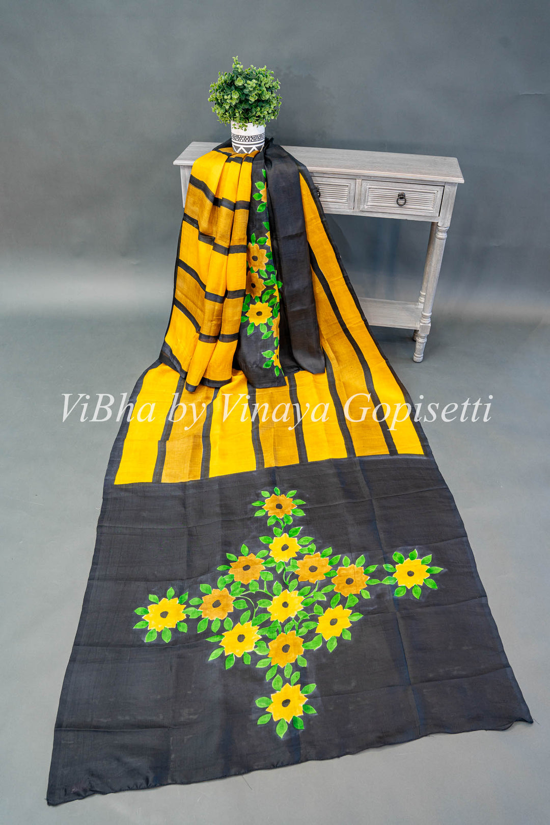 Yellow and Black Handpainted Tussar Silk Saree And Blouse