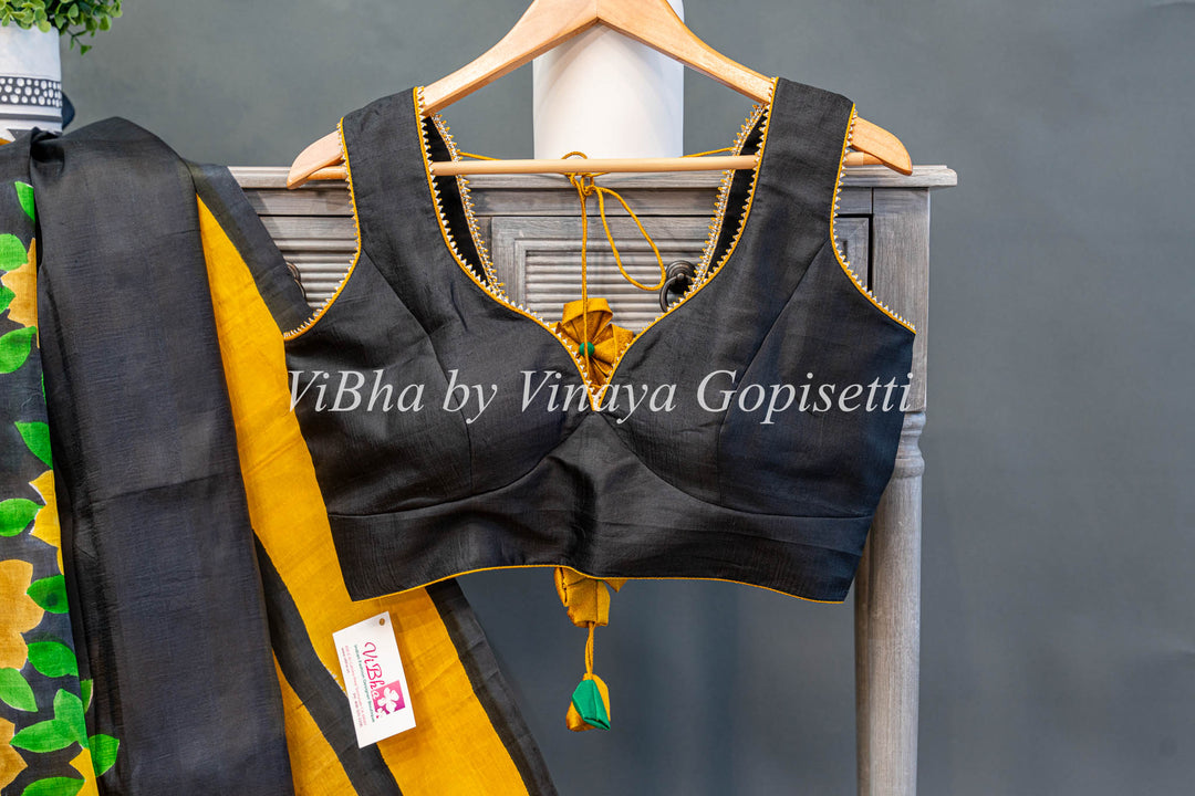 Yellow and Black Handpainted Tussar Silk Saree And Blouse