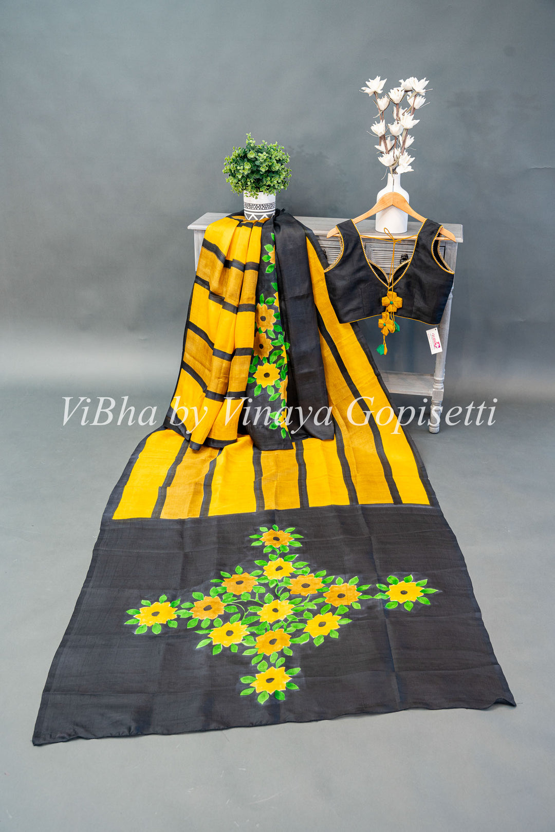 Yellow and Black Handpainted Tussar Silk Saree And Blouse