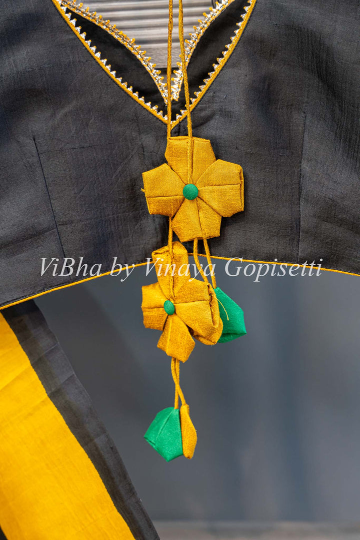 Yellow and Black Handpainted Tussar Silk Saree And Blouse