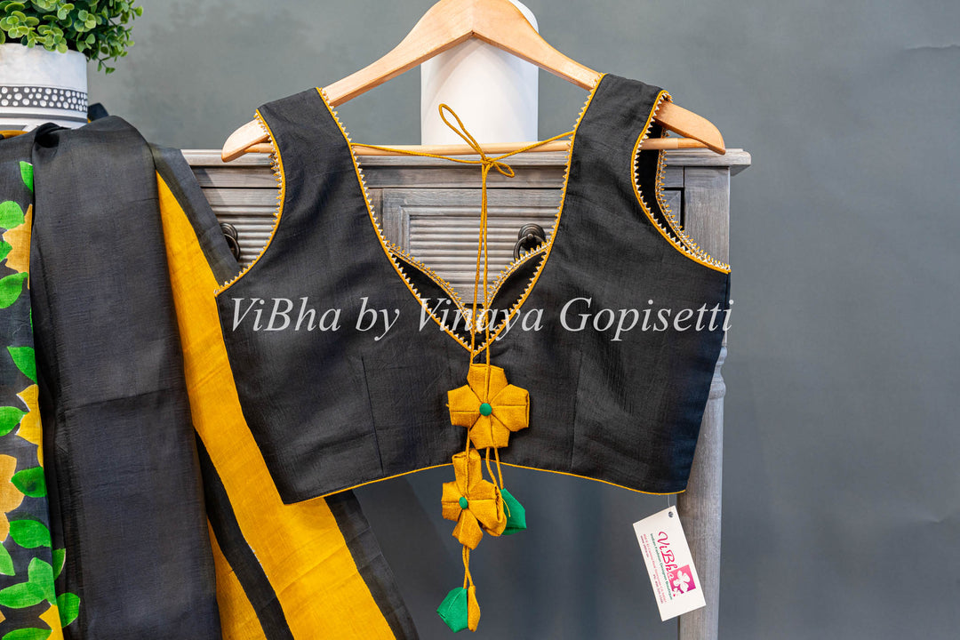 Yellow and Black Handpainted Tussar Silk Saree And Blouse