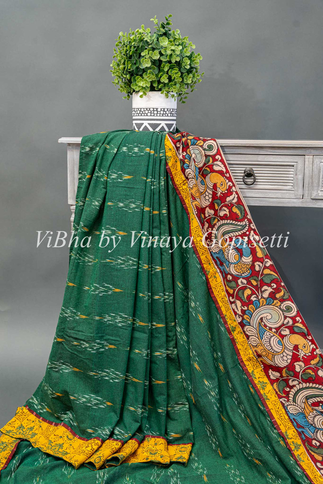 Green Ikkat Handloom Cotton With Yellow and Maroon Red Pen Kalamkari Borders Fusion Saree And Blouse