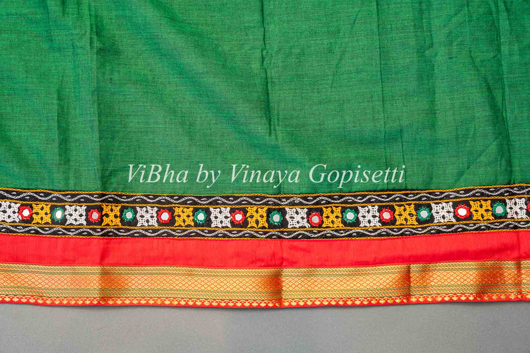 Green Handloom Cotton With Ikkat Weave And Kutch Borders Saree And Blouse