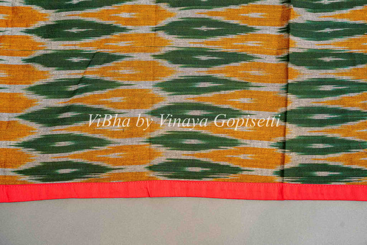 Green Handloom Cotton With Ikkat Weave And Kutch Borders Saree And Blouse