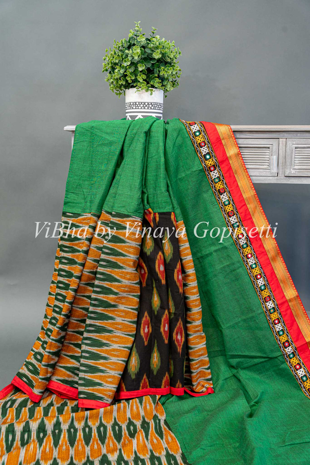 Green Handloom Cotton With Ikkat Weave And Kutch Borders Saree And Blouse