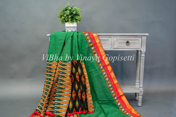 Green Handloom Cotton With Ikkat Weave And Kutch Borders Saree And Blouse