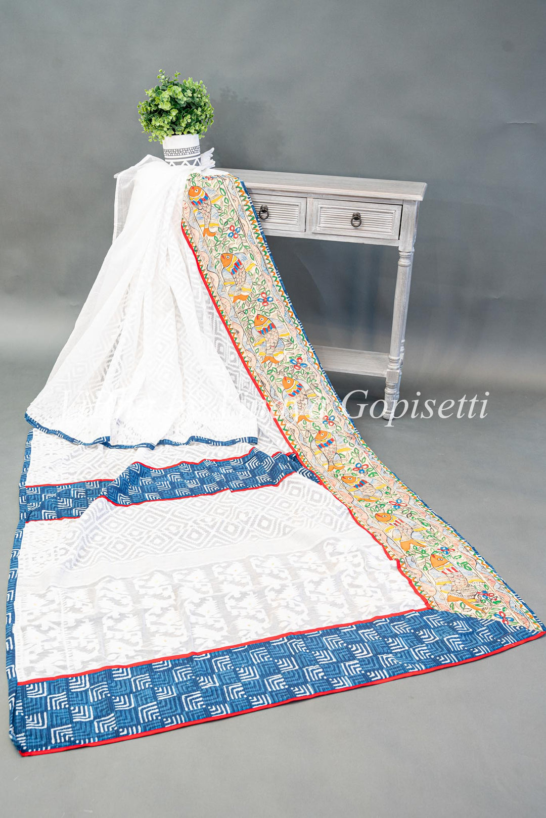 White and blue batik fusion saree with Fish motifs