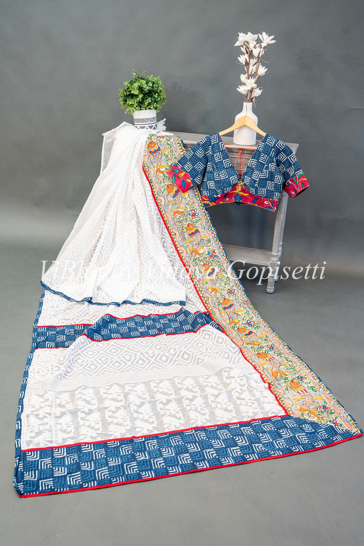 White and blue batik fusion saree with Fish motifs