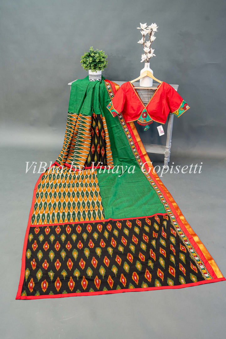 Green Handloom Cotton With Ikkat Weave And Kutch Borders Saree And Blouse