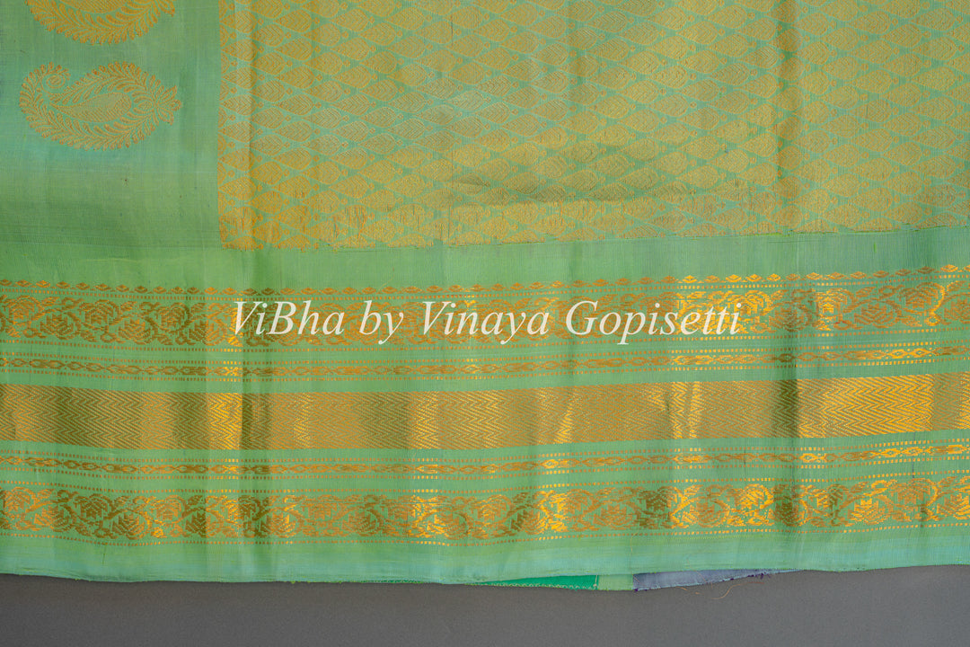 Mint Green And Purple Gadwal Silk Saree And Blouse