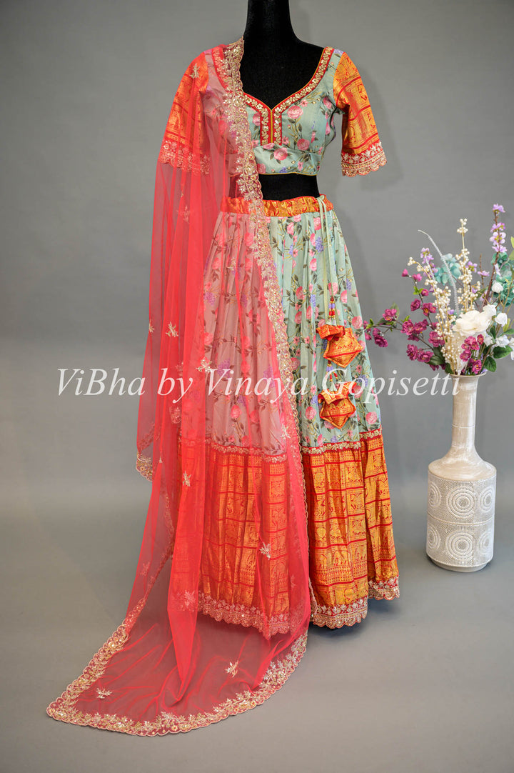 Light Green Floral Kanchi Silk Lehenga With Embroidered Borders And Red Net Embroidered Dupatta