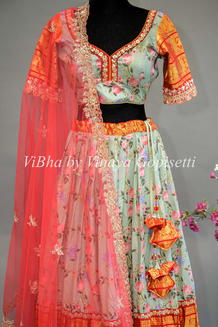 Light Green Floral Kanchi Silk Lehenga With Embroidered Borders And Red Net Embroidered Dupatta