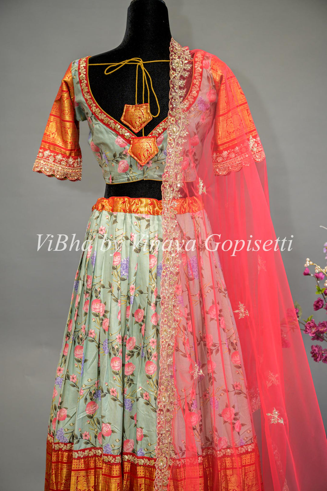 Light Green Floral Kanchi Silk Lehenga With Embroidered Borders And Red Net Embroidered Dupatta