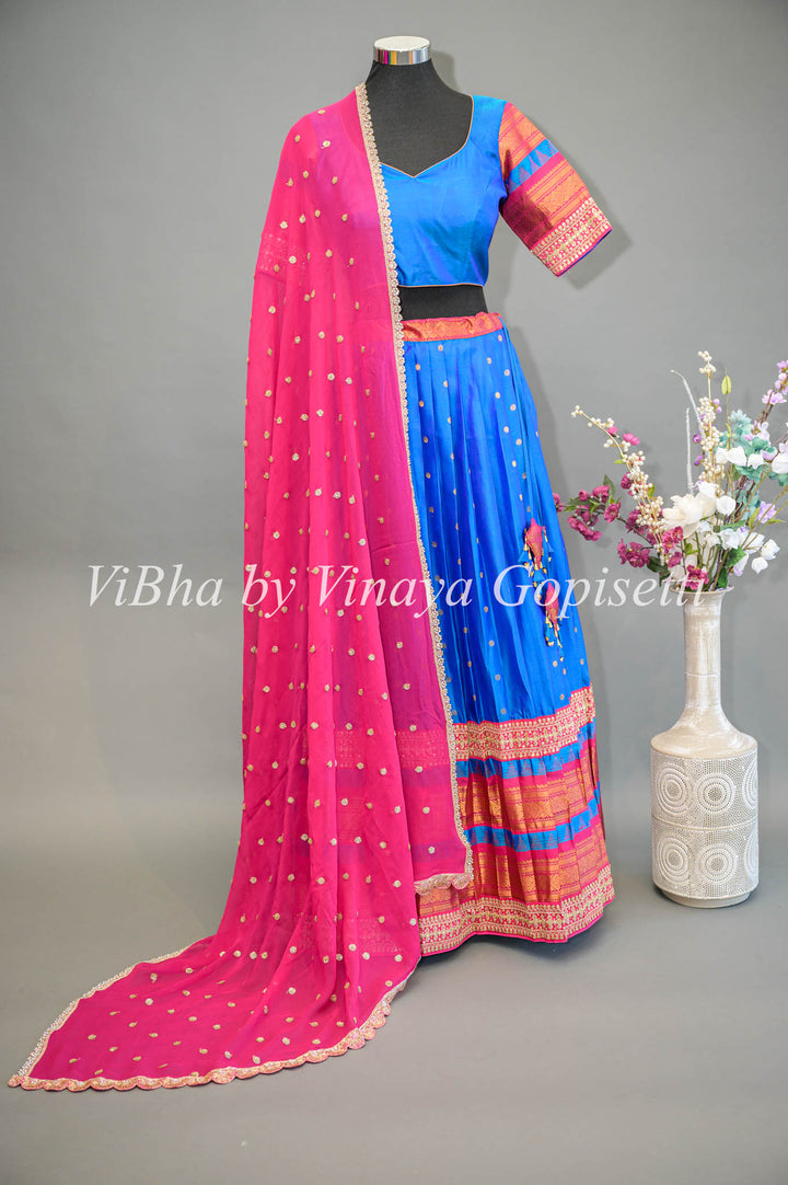 Royal Blue and Pink Gadwal Silk Lehenga with Embroidered Borders And Rani Pink Embroidered Dupatta