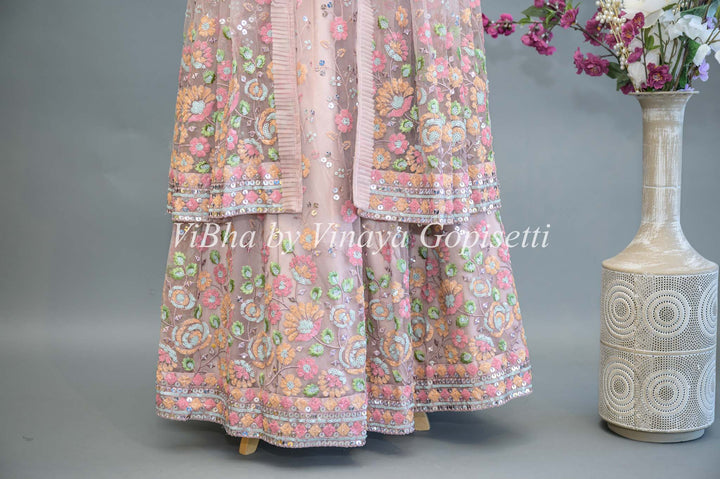 Pastel Pink Net Hand Embroidered Lehenga With Detachable Jacket