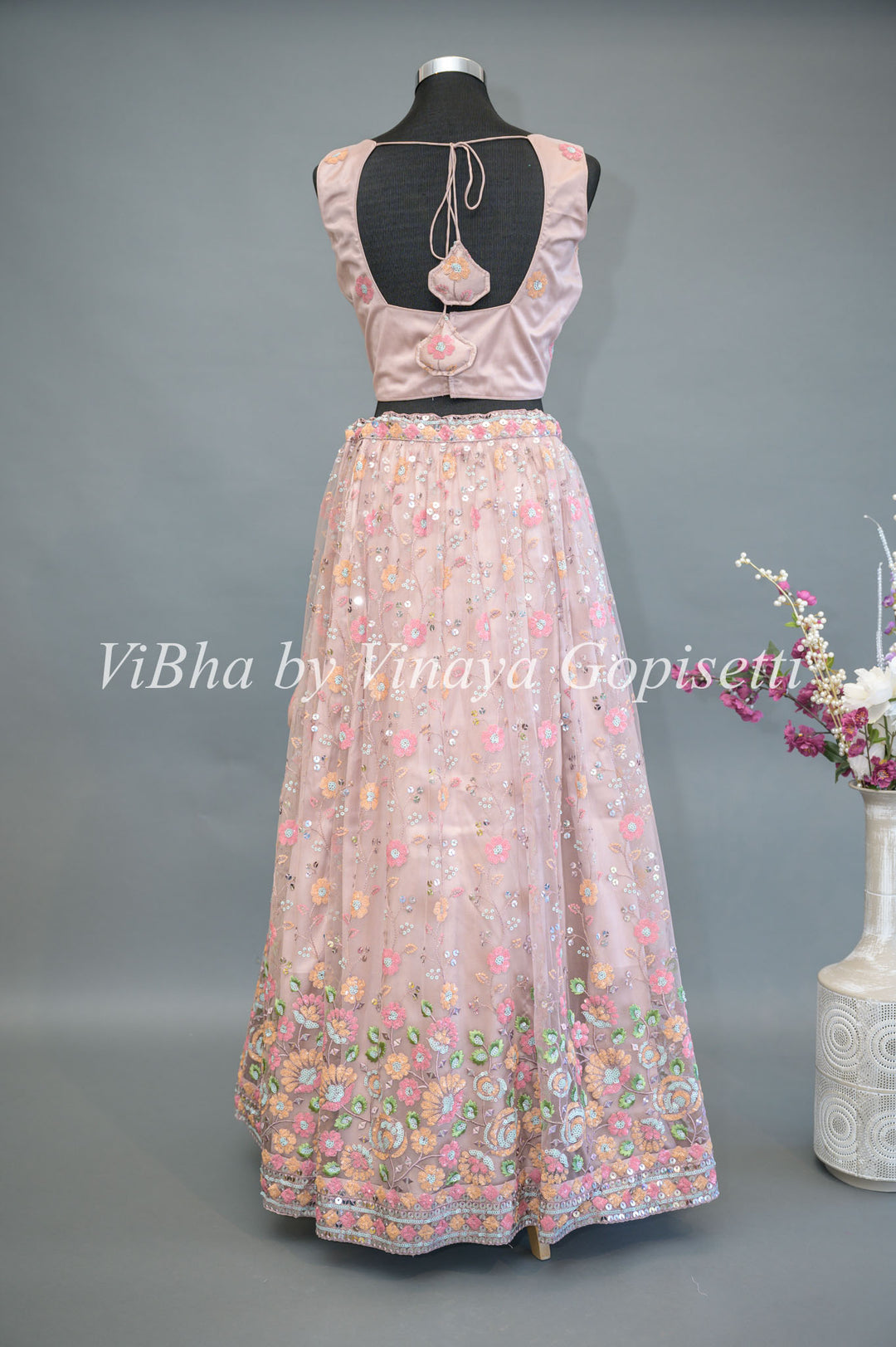 Pastel Pink Net Hand Embroidered Lehenga With Detachable Jacket