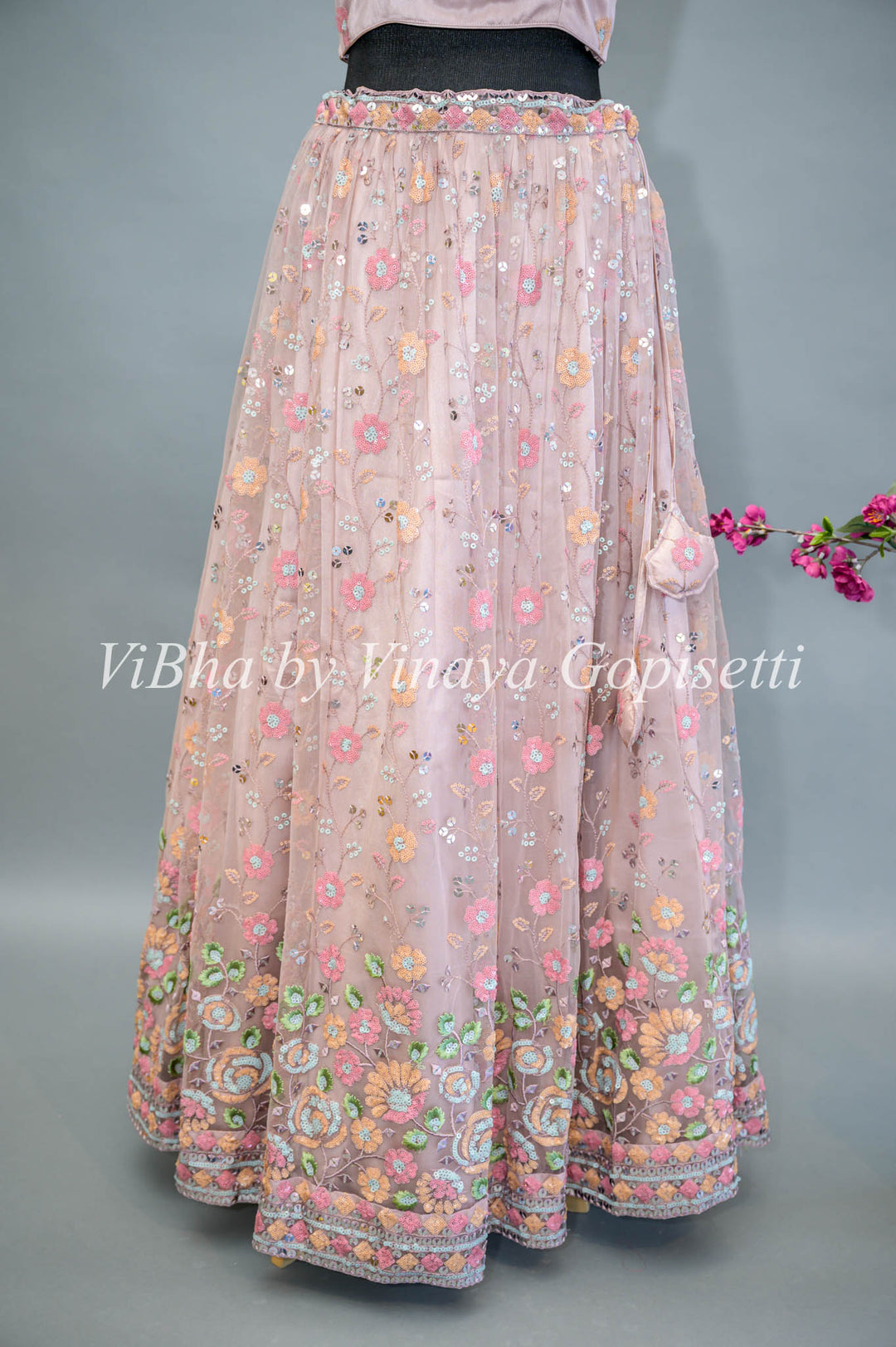 Pastel Pink Net Hand Embroidered Lehenga With Detachable Jacket