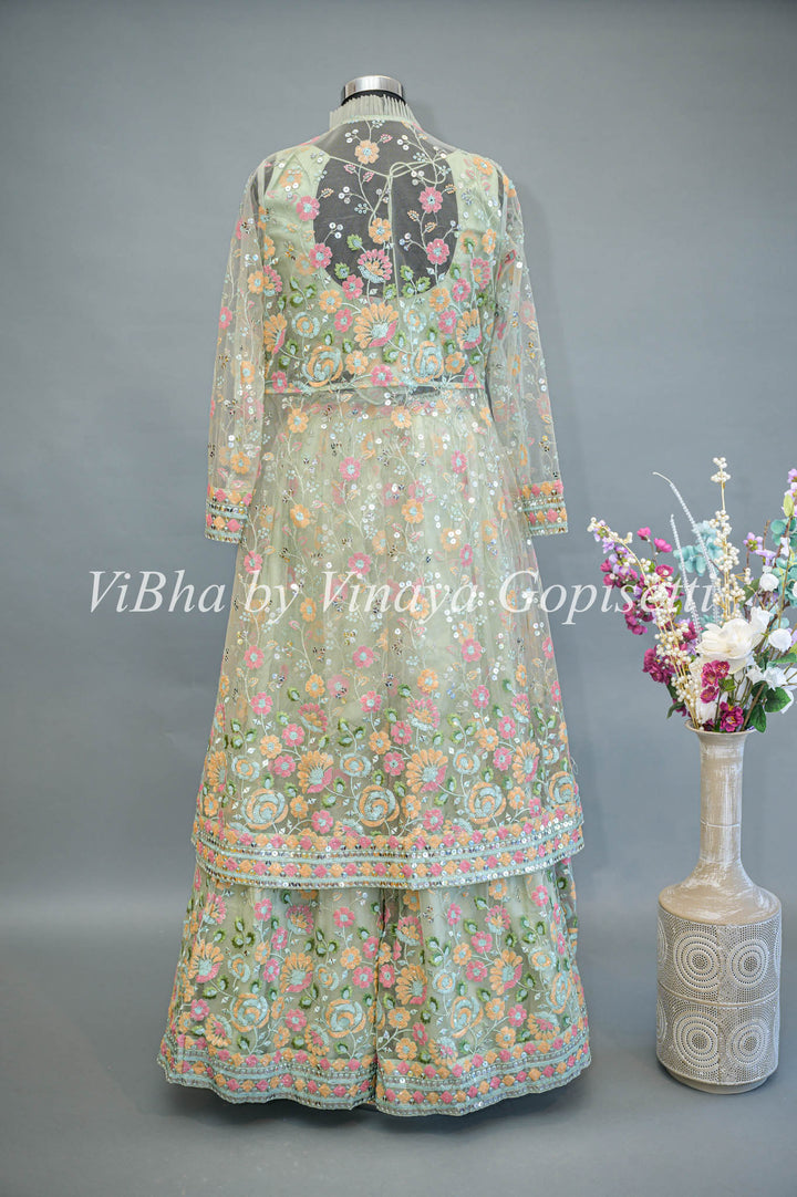 Pastel Green Net Embroidered Lehenga With Detachable Jacket